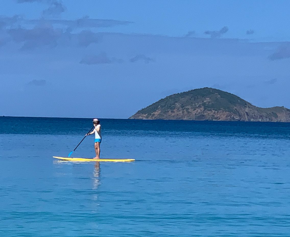 A picture of Dr. Clark paddleboarding