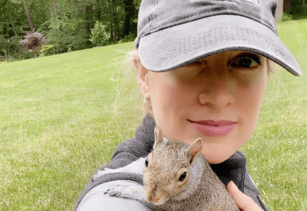 A picture of Dr. James with a squirrel